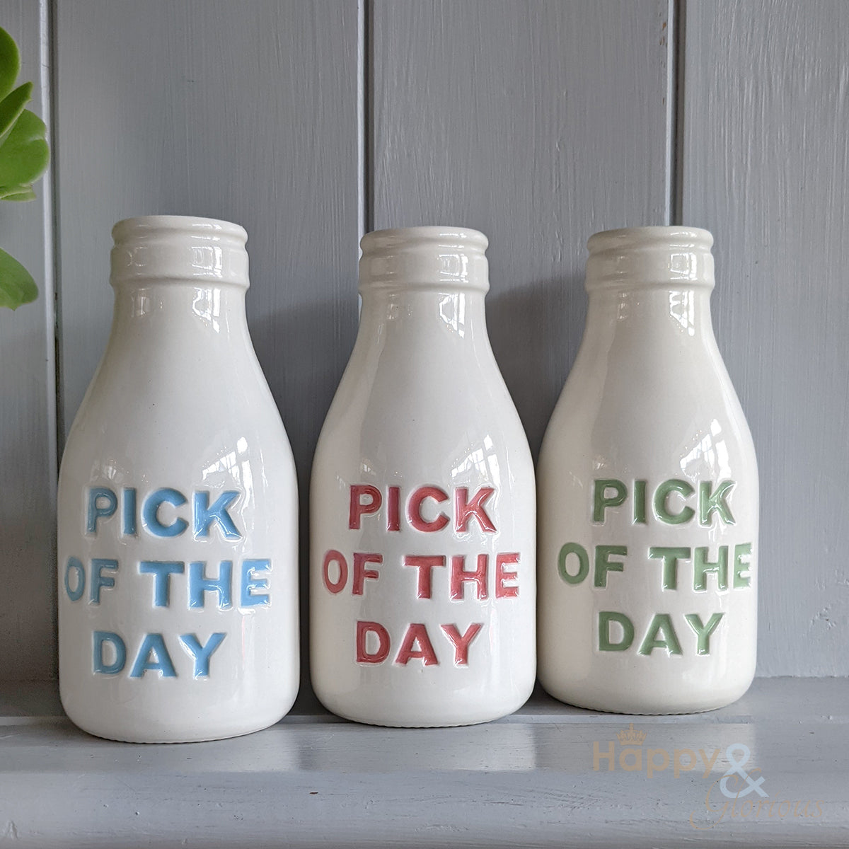 Red ceramic 'Pick of the Day' bottle vase
