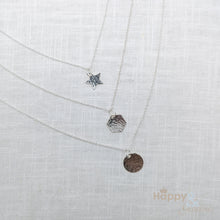 Sterling silver hammered star charm necklace