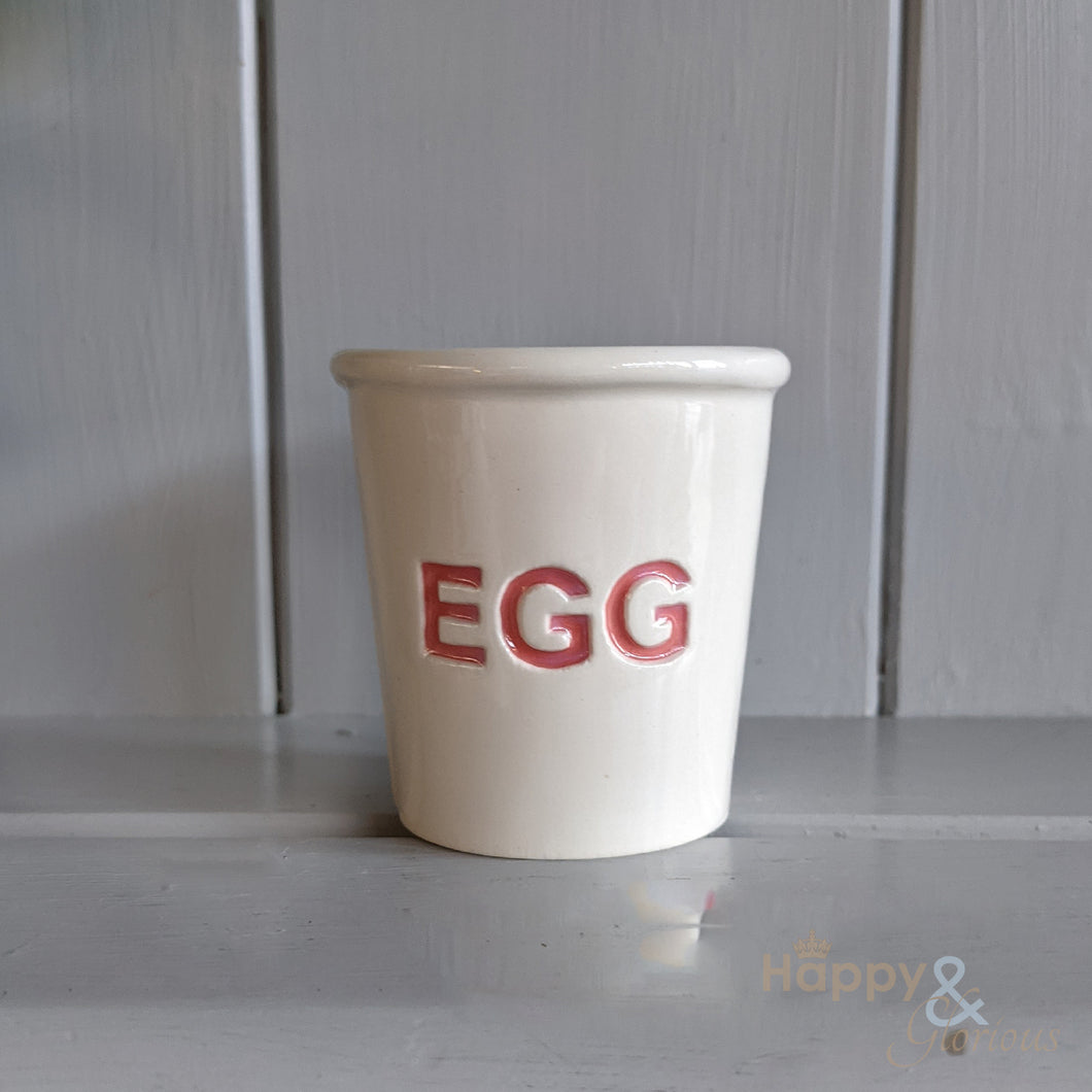 Red ceramic egg cup by Katie Brinsley