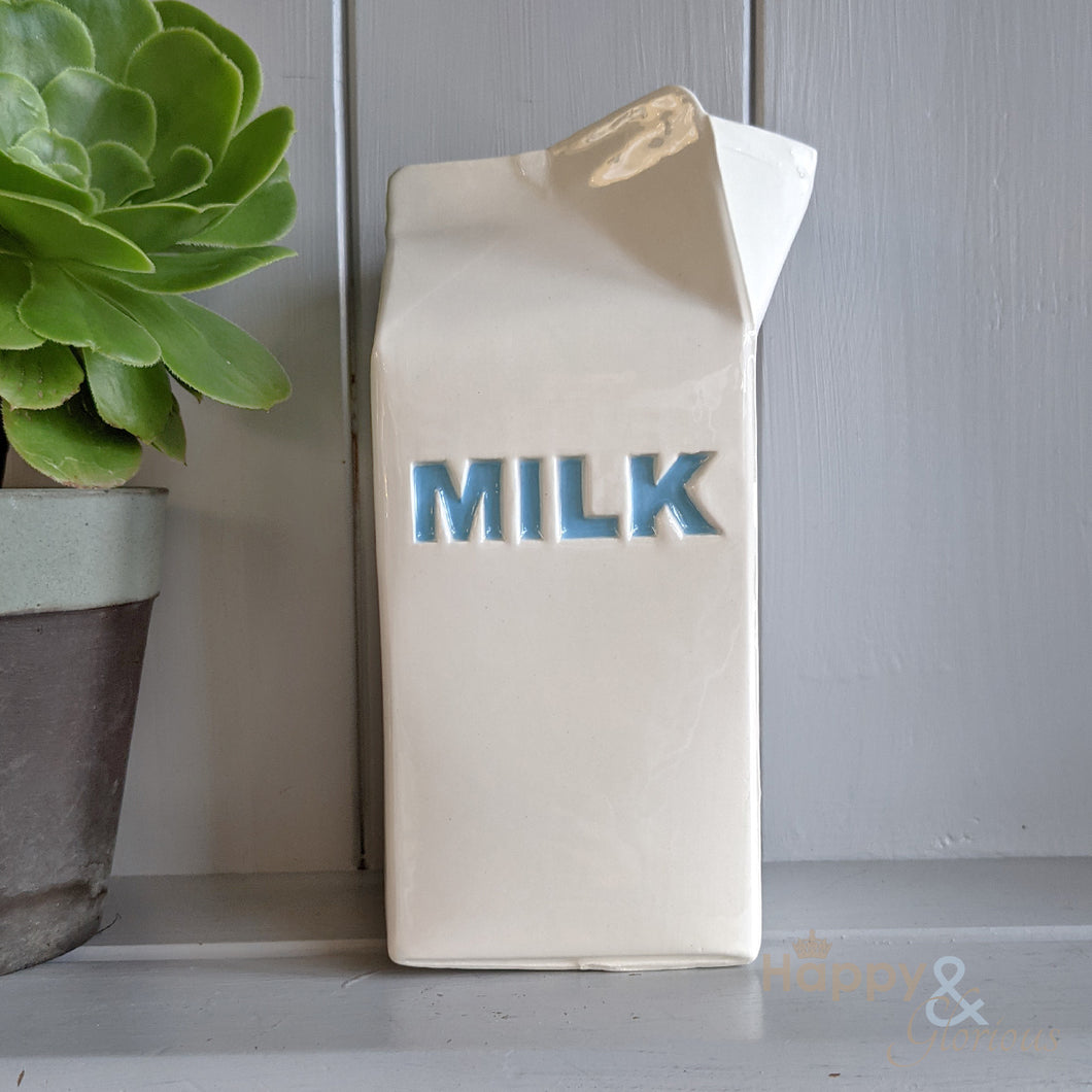 Blue ceramic milk carton jug