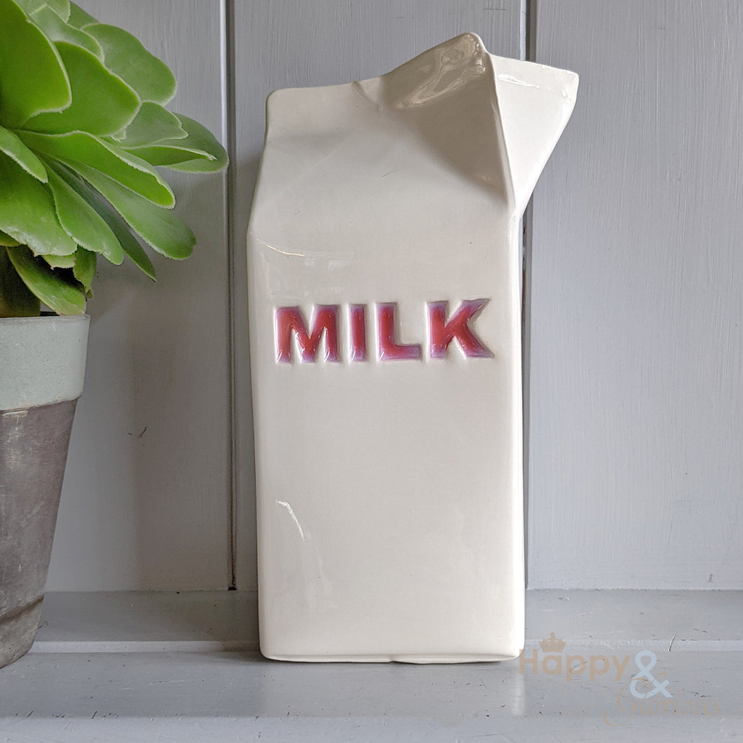 Red ceramic milk carton jug
