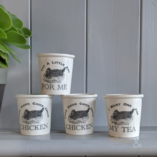 Set of four chicken ceramic egg cups by Katie Brinsley